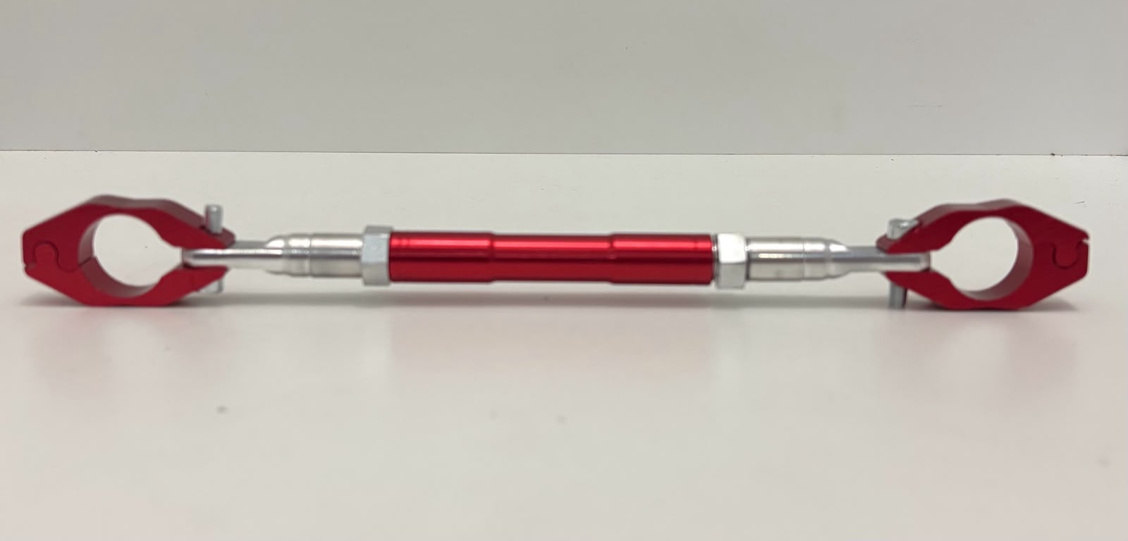 BARRA MANUBRIO ANONIZADA REGULABLE ROJA