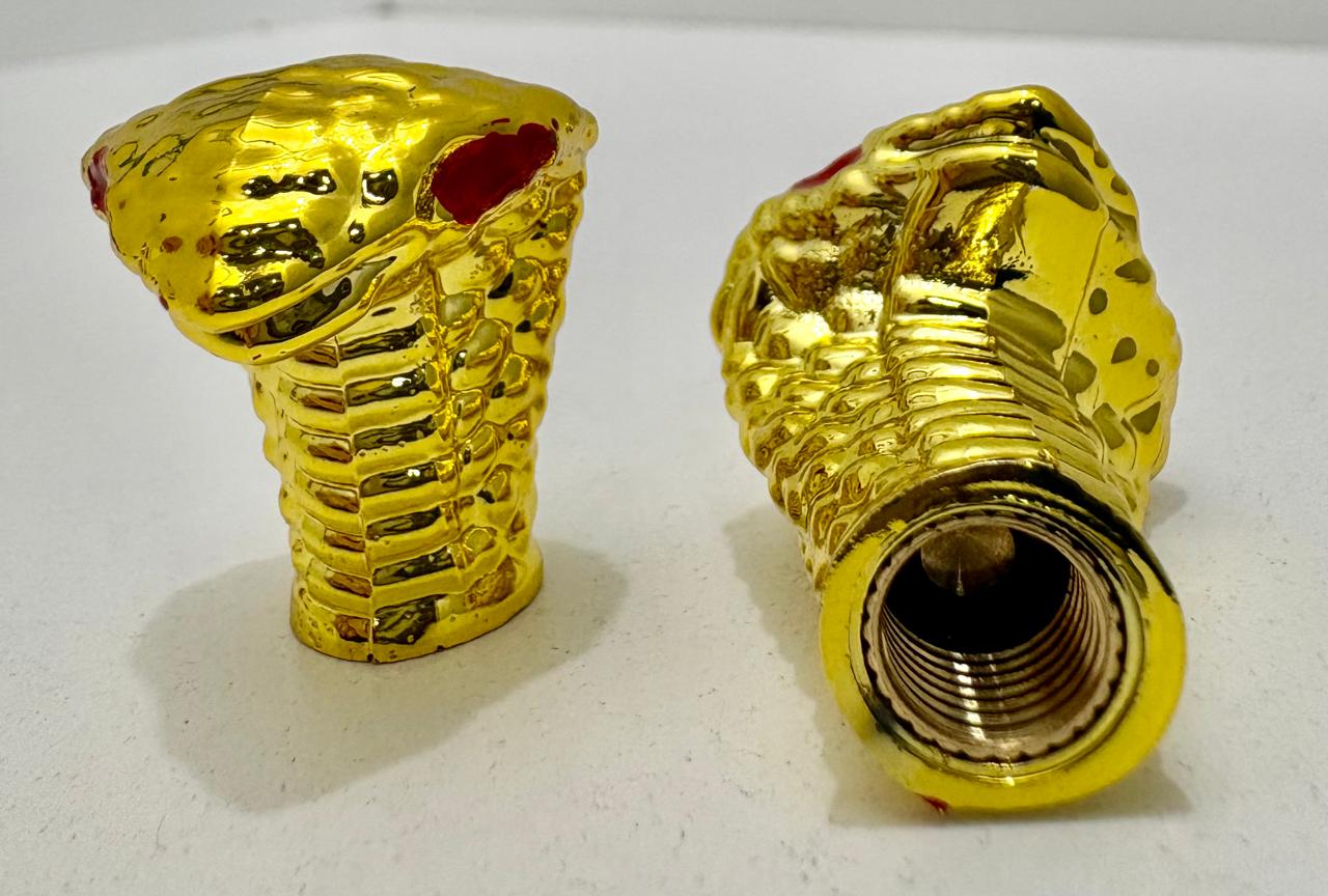 TAPON VALVULA RUEDA SERPIENTE DORADA